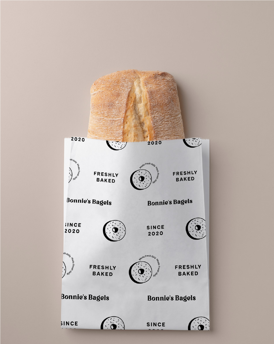 PACKAGING IMAGE packaging image, bag with bread inside with bonnie's bagel pattern and illustrated donuts